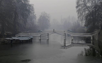 Waterbodies across Kashmir Valley freeze, temperature plummets below zero