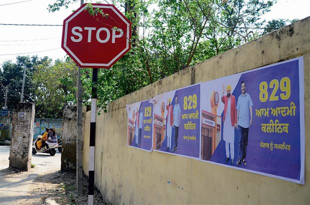 Poll code in force, but hoardings, wall paintings continue to dot city