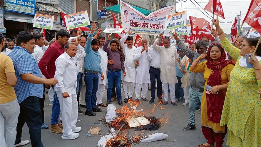 INDIA bloc activists protest Arvind Kejriwal’s arrest in Bhiwani