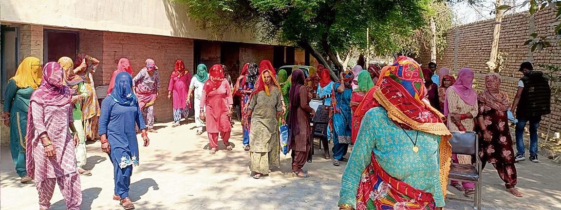 Female relatives of 20 absconding suspects complain of  harassment