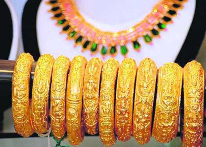 Gold hits record high of Rs 65,000 per 10 grams