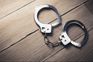 Two held for duping man