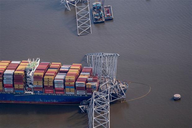 First cargo ship passes through newly opened channel in Baltimore since bridge was struck, collapsed