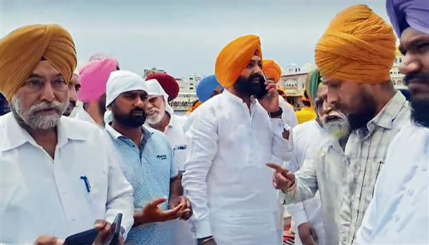 Minister faces ire at Golden Temple as devotees pose queries over ending drug menace