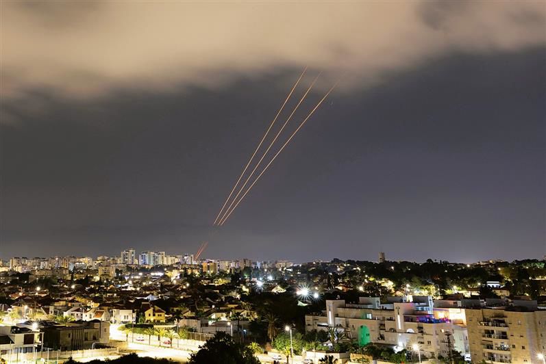Days after attack on consulate, Iran fires 300 drones, missiles at Israel