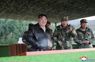 North Korea says it tested new solid-fuel intermediate-range missile with hypersonic warhead