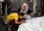 Israeli strikes on southern Gaza city of Rafah kill 18, mostly children, as US advances aid package