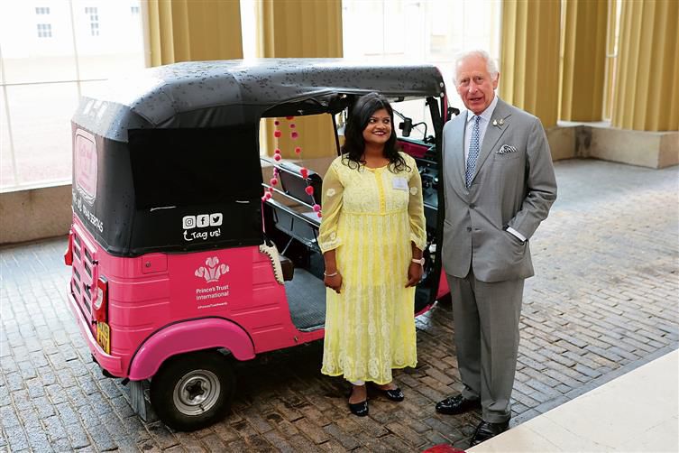 King Charles fetes UP’s pink e-rickshaw driver