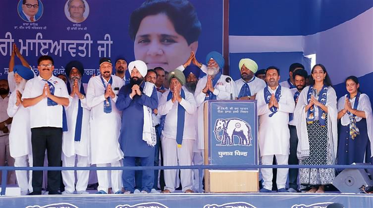 BSP workers, supporters carry flexes of leaders home after Nawanshahr rally