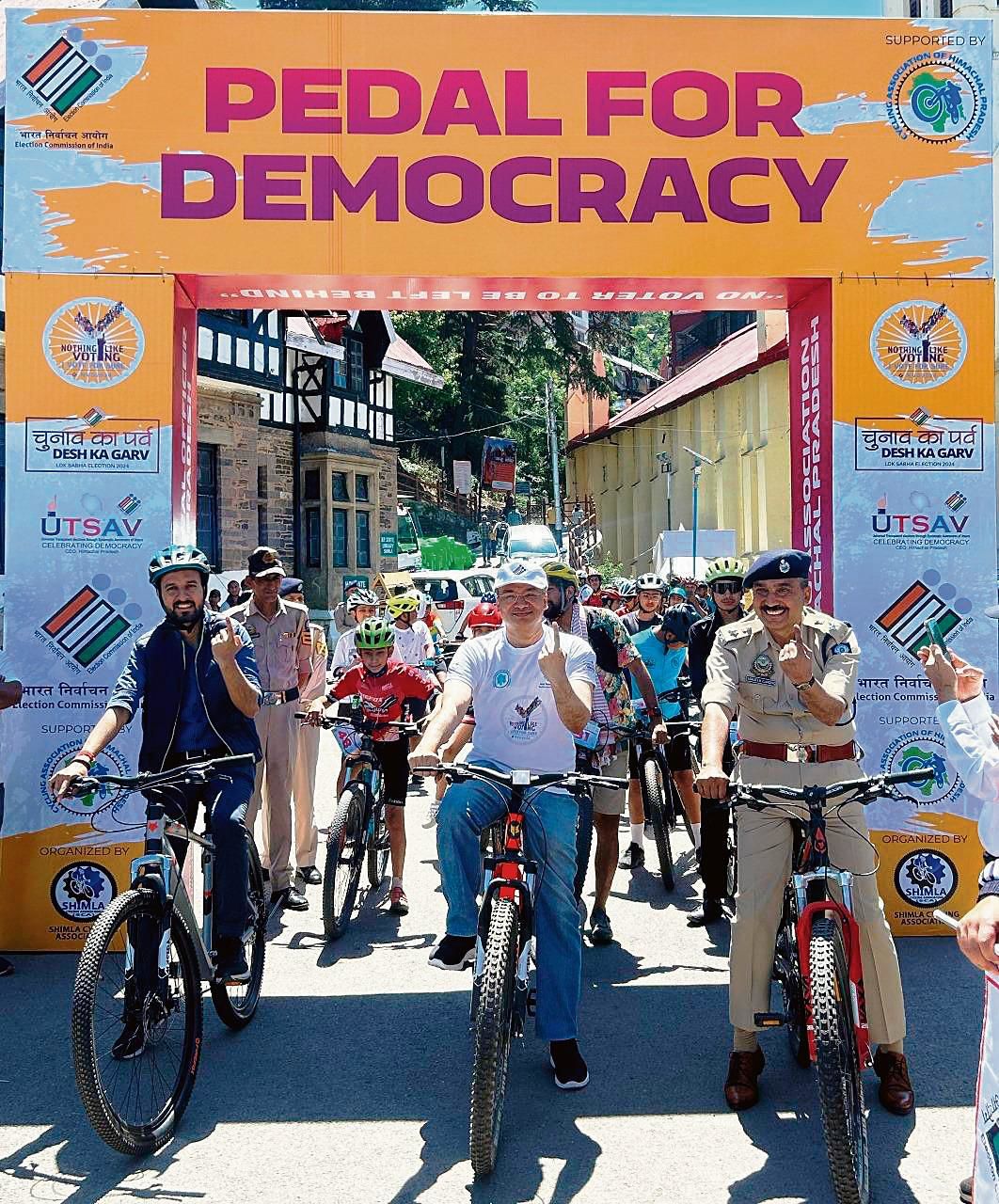 Cyclists, children, officials ‘Pedal for Democracy’