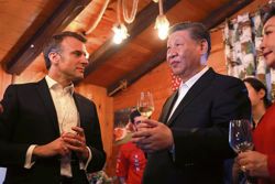 With lamb & cheese, Macron  tries to charm Xi in Pyrenees