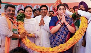 Smriti Irani flays AAP, Congress for corruption, bid to divide country