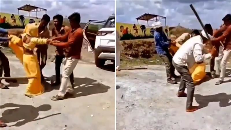 Woman beaten mercilessly with a wooden stick by 4 men; onlookers shoot video