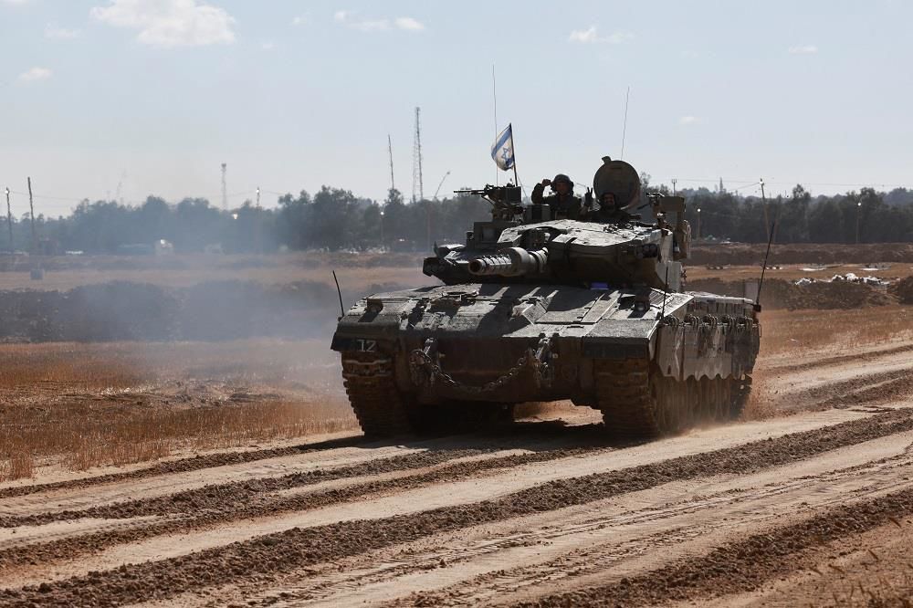 Israeli tanks backed by warplanes, drones advance deeper into Rafah
