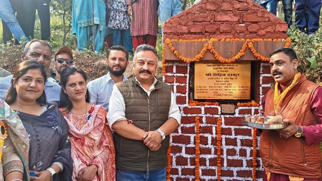 Education Minister lays stone of community bhawan