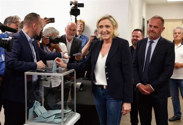 Massive turnout in France’s high-stakes elections as support for far right grows